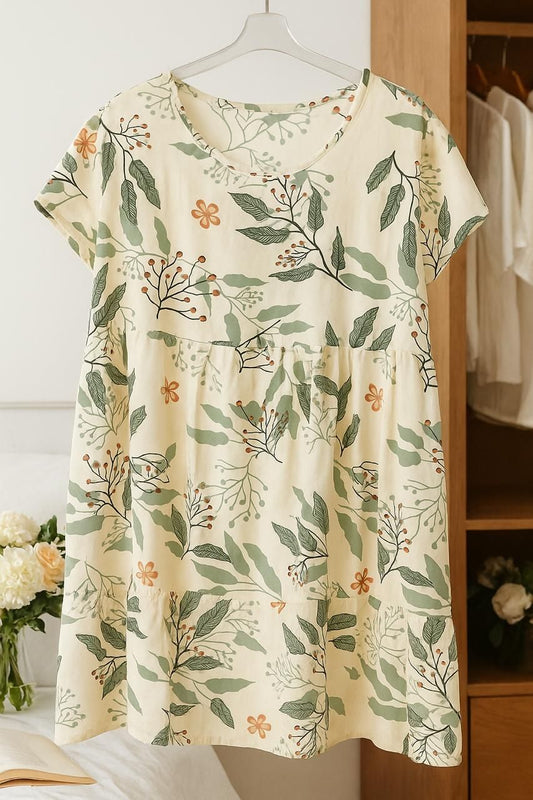 Floral patterned dress on a hanger with a neutral background