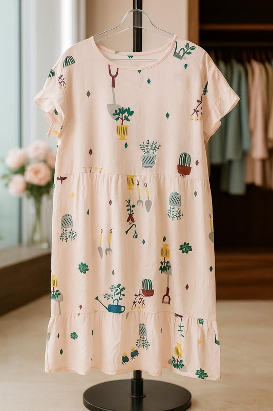 Beige dress with plant pattern on a hanger